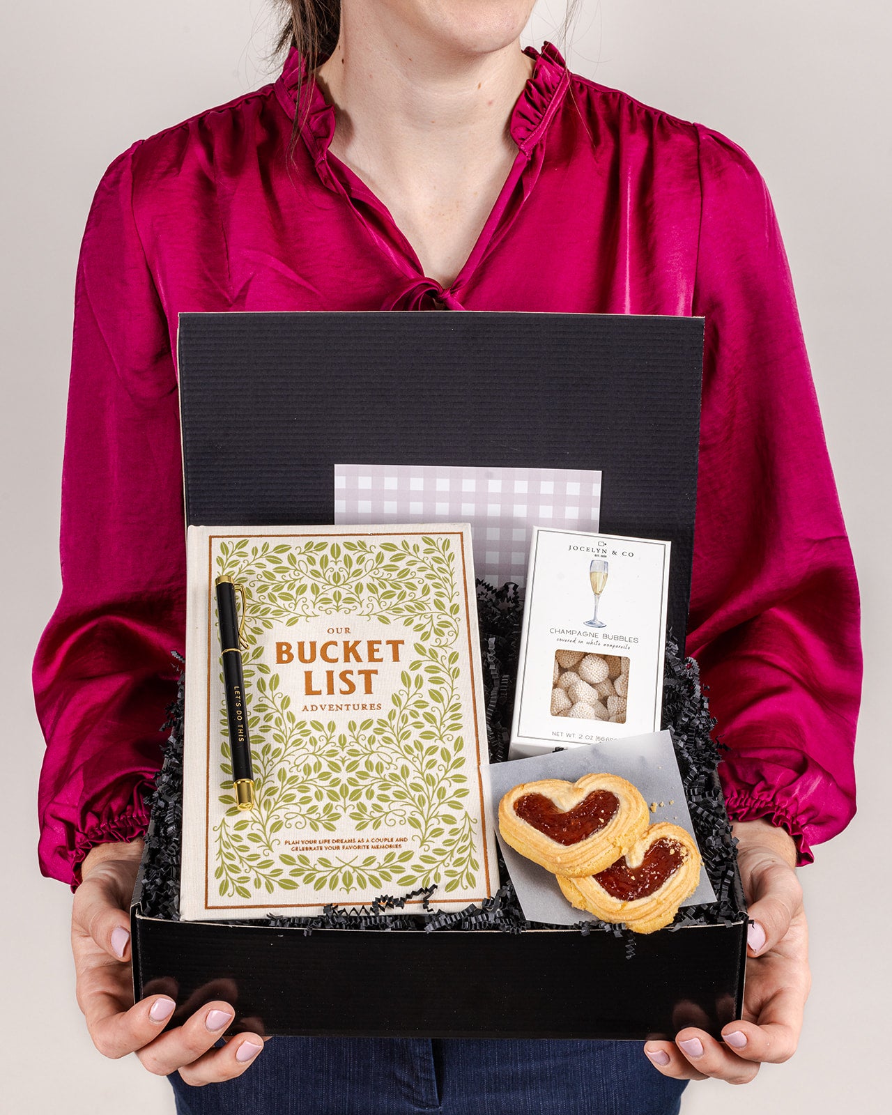 Adventures for Two gift box featuring a bucket list book, pen, treats, and a stylish presentation.