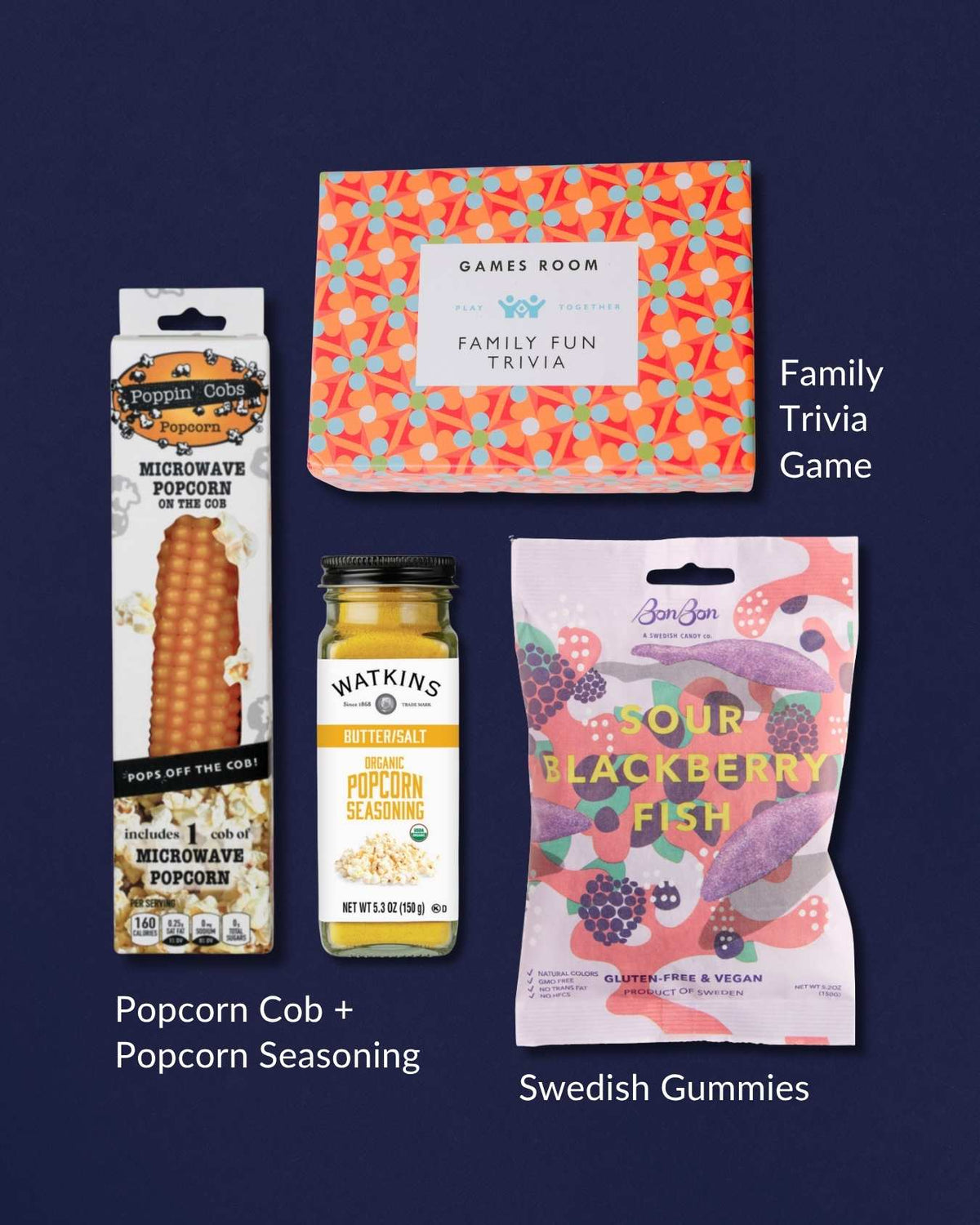 Family Fun Night gift set featuring a trivia game, popcorn on the cob, organic butter salt seasoning, and sour Swedish gummies.