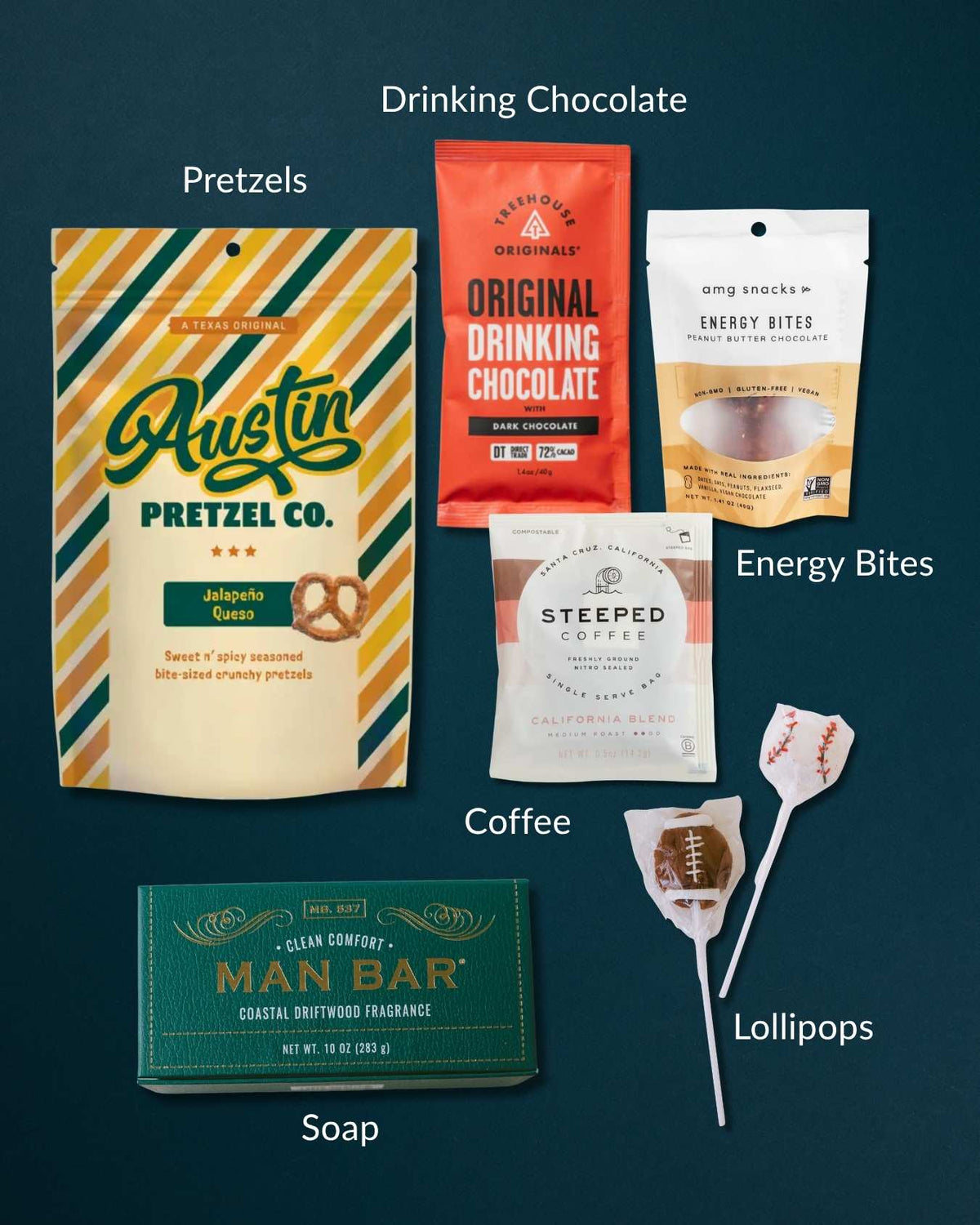 For Every Man gift set featuring a Man Bar soap, Austin jalapeno pretzels, drinking chocolate, energy bites, coffee, and lollipops.
