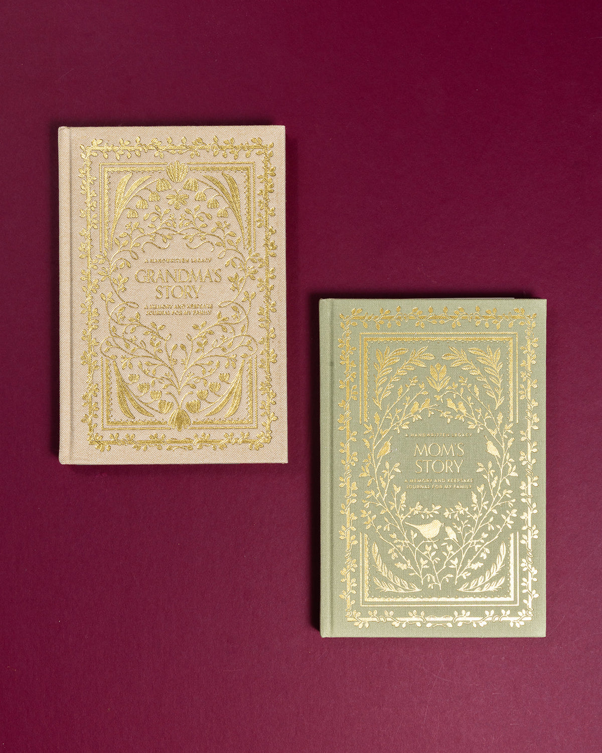 Beige Grandma's Story and sage green Mom's Story keepsake journals with elegant gold foil floral cover designs.
