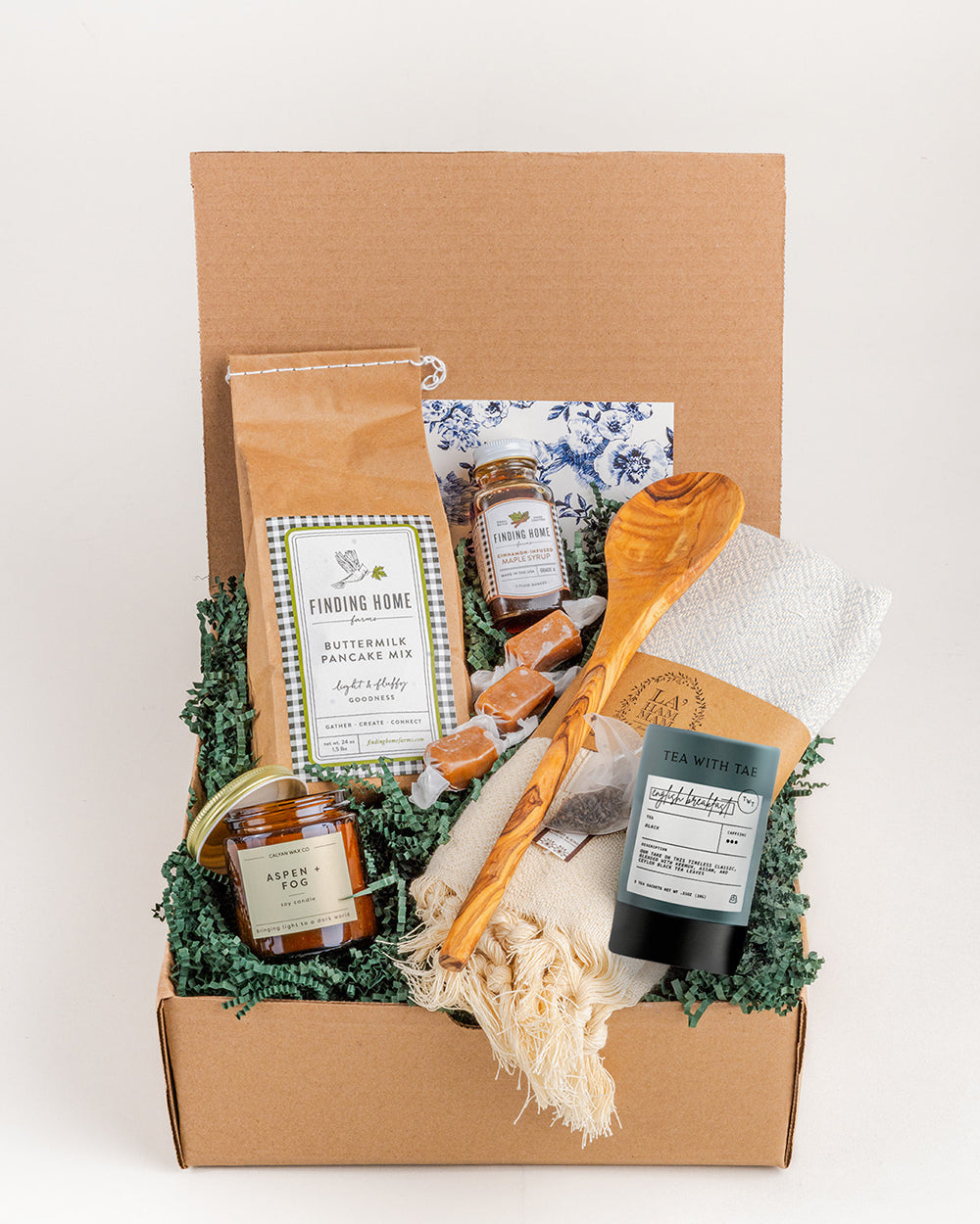 Pancake Breakfast gift box with buttermilk mix, syrup, spoon, and tea, all beautifully arranged in a kraft box.