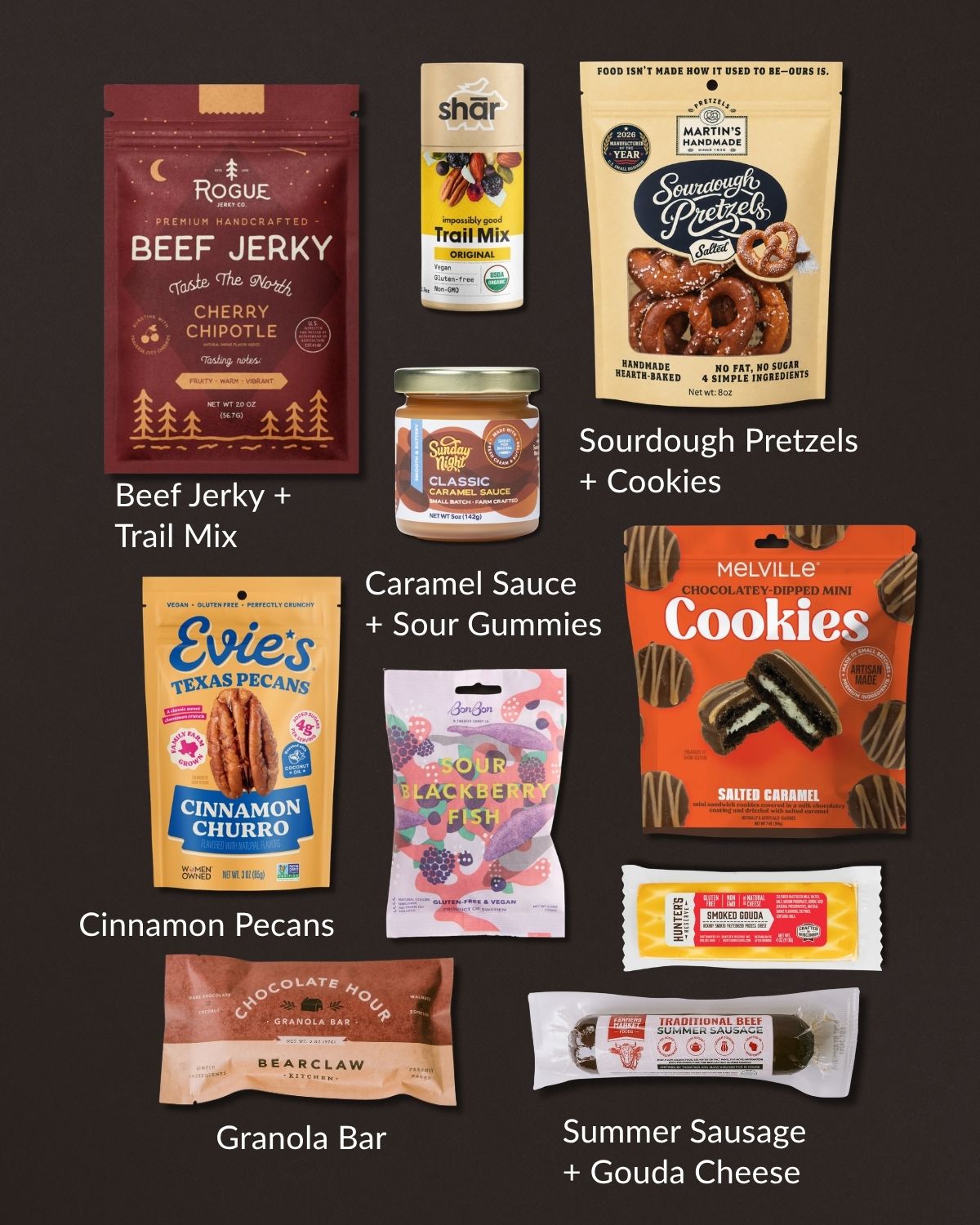 Snack Attack gift set featuring beef jerky, sourdough pretzels, caramel sauce, cinnamon pecans, gummies, cookies, and sausage.