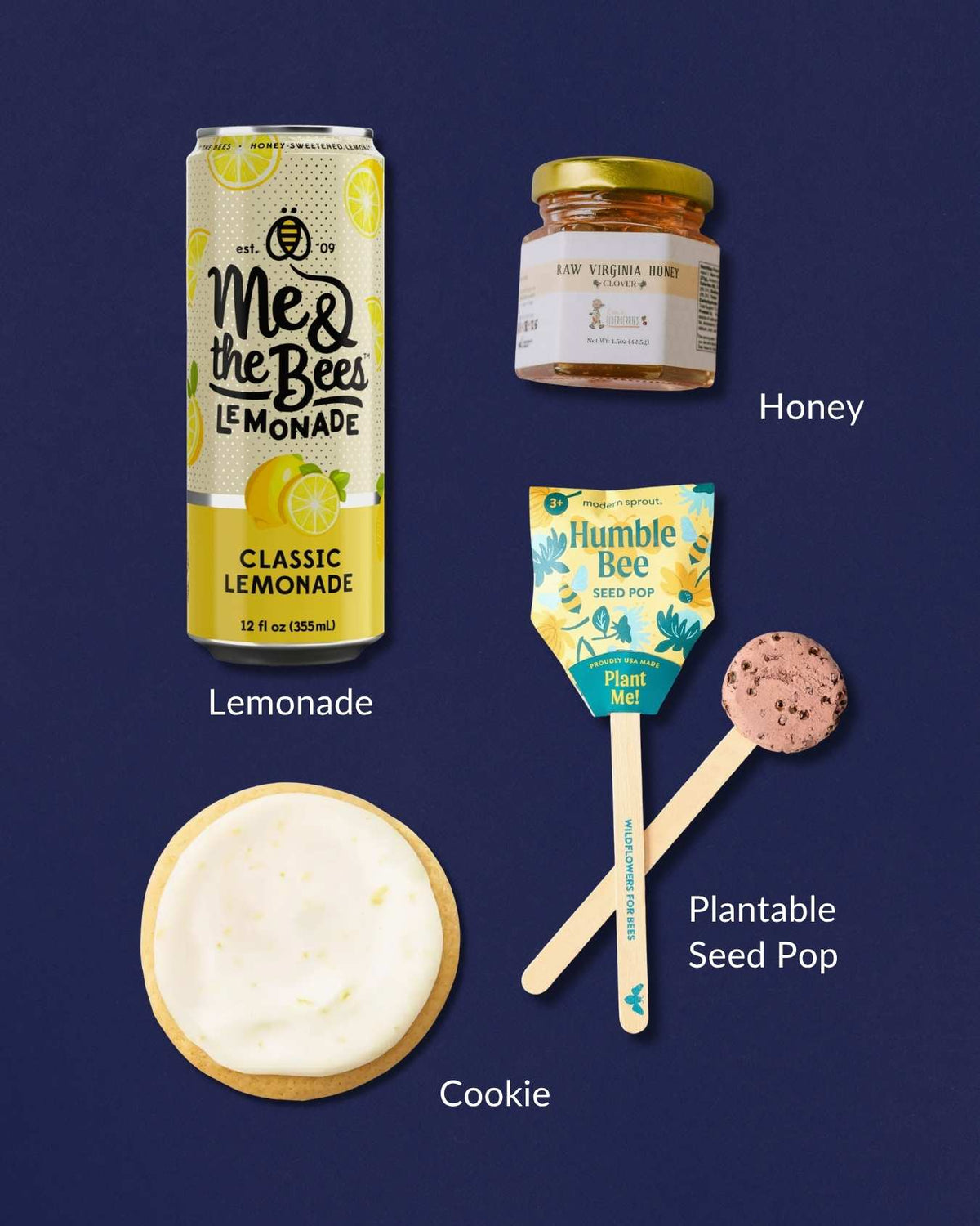 The Bee's Knees gift set with Me & the Bees lemonade, raw honey, a lemon-glazed cookie, and a plantable seed pop.