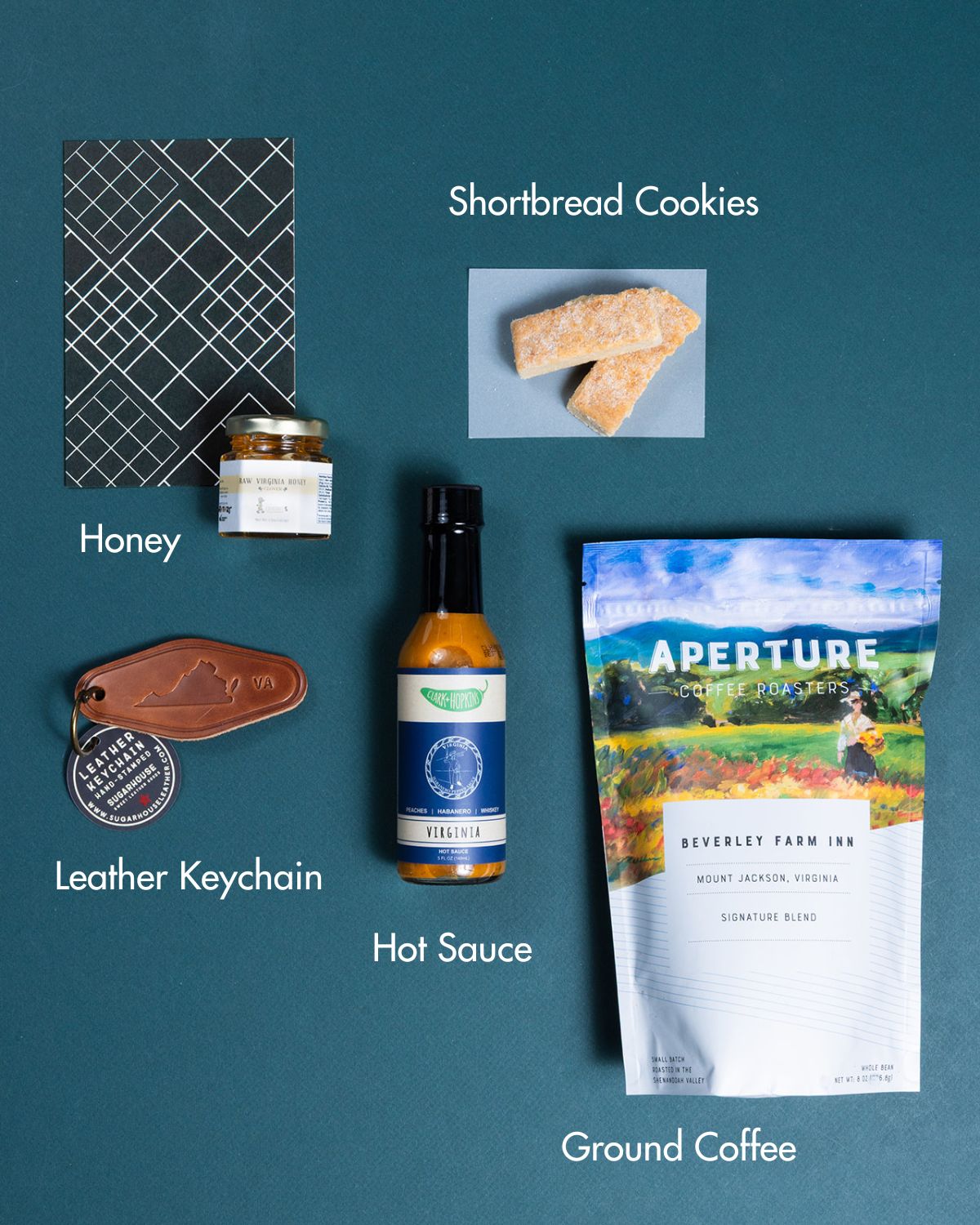 Virginia gift box featuring Aperture coffee, Clark & Hopkins hot sauce, raw honey, shortbread cookies, and a leather keychain.