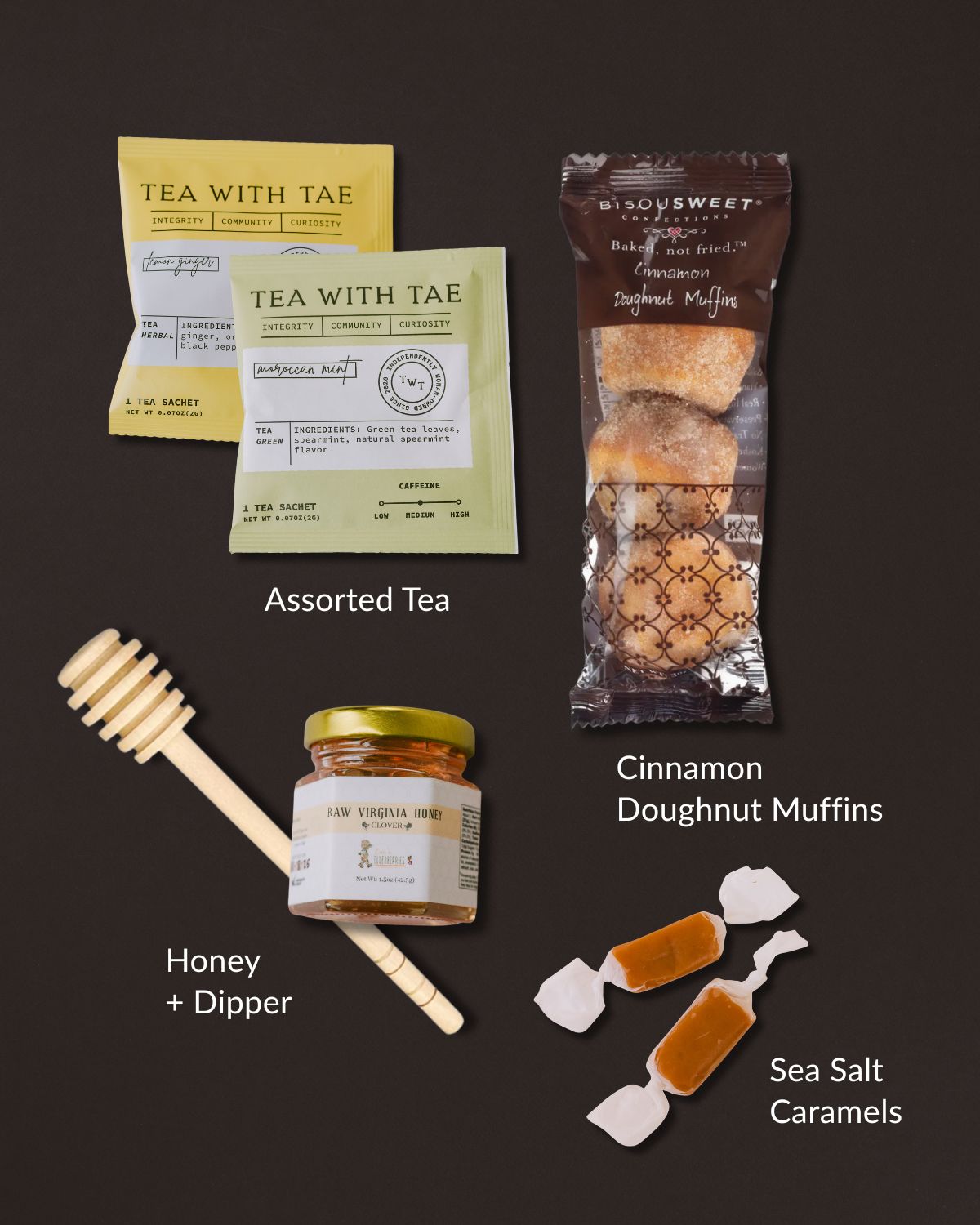 Autumn Hello gift set with cinnamon doughnut muffins, two tea bags, raw honey with a wooden dipper, and sea salt caramels.