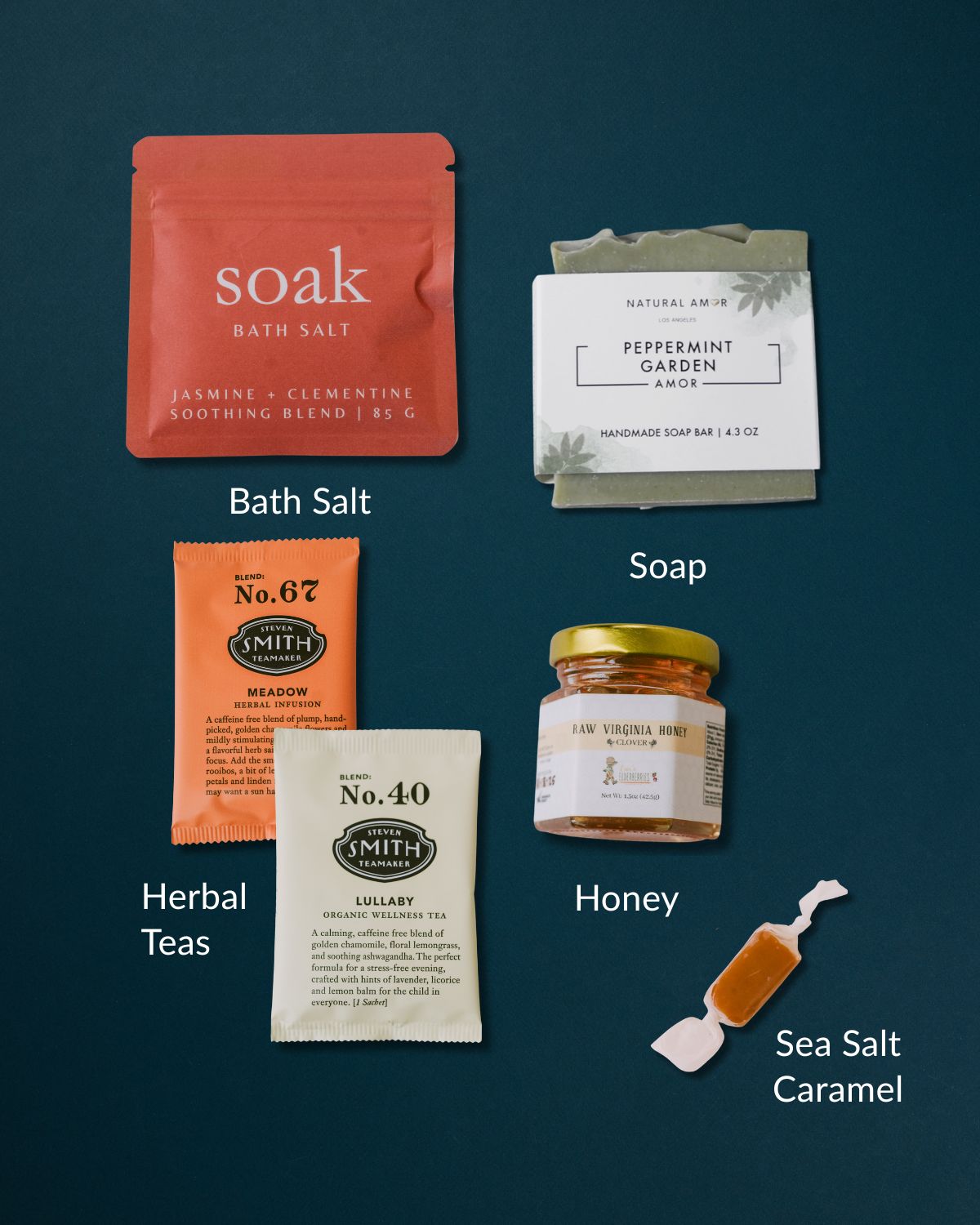 Comforting Hello care package with bath salts, peppermint soap, two herbal tea sachets, raw honey, and a sea salt caramel.