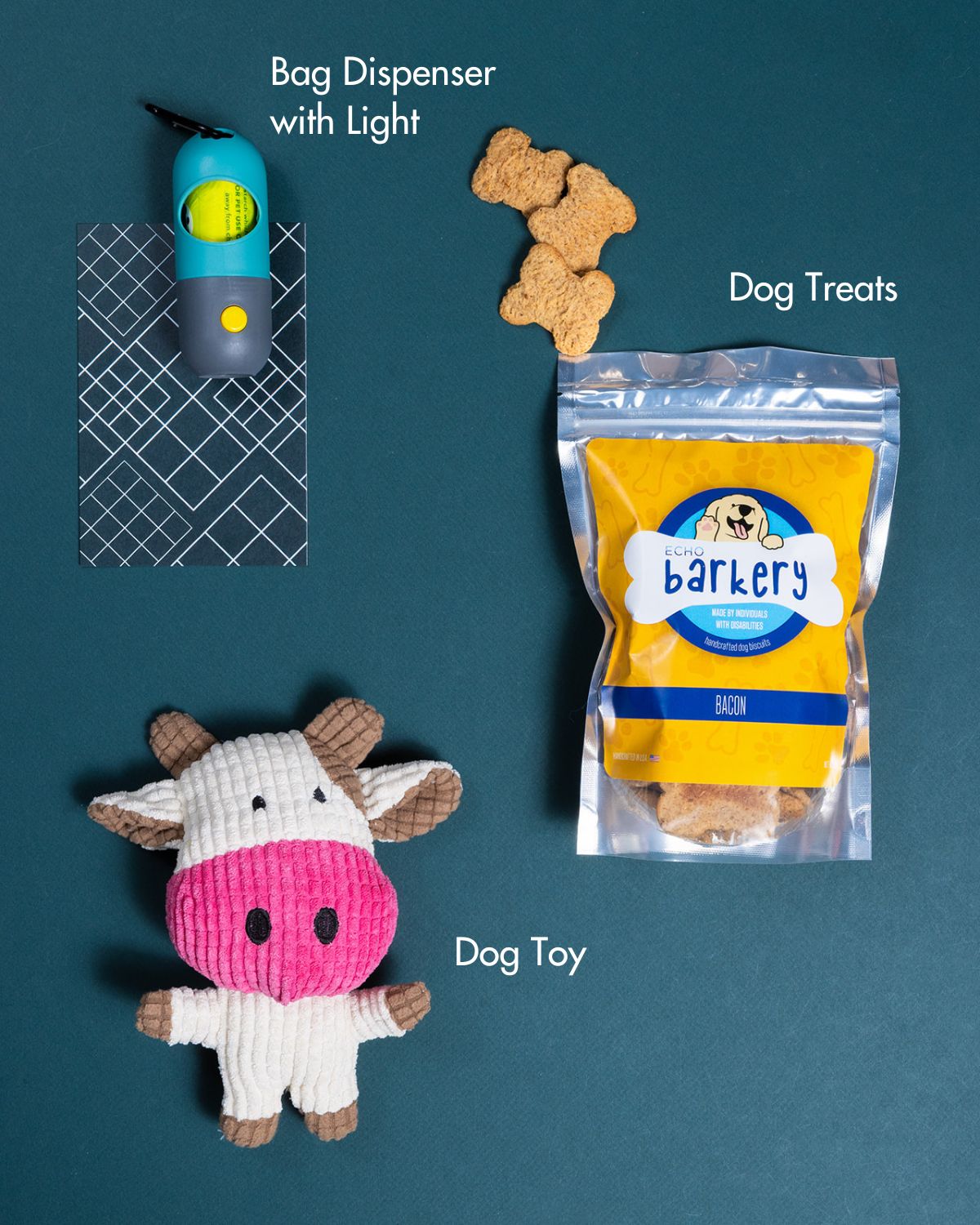 Fur-Ever Friend gift set with a plush cow toy, bacon dog treats, and a teal bag dispenser with a flashlight.